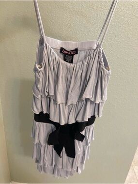 Lipstick Boutique Light Gray Ruffle Dress with Black Waist Bow